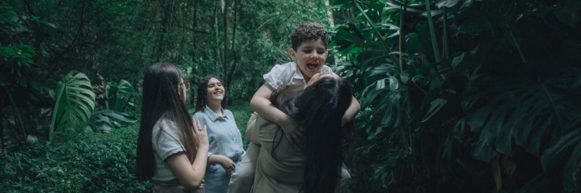 A joyful family bonding in a lush green forest, embracing nature.